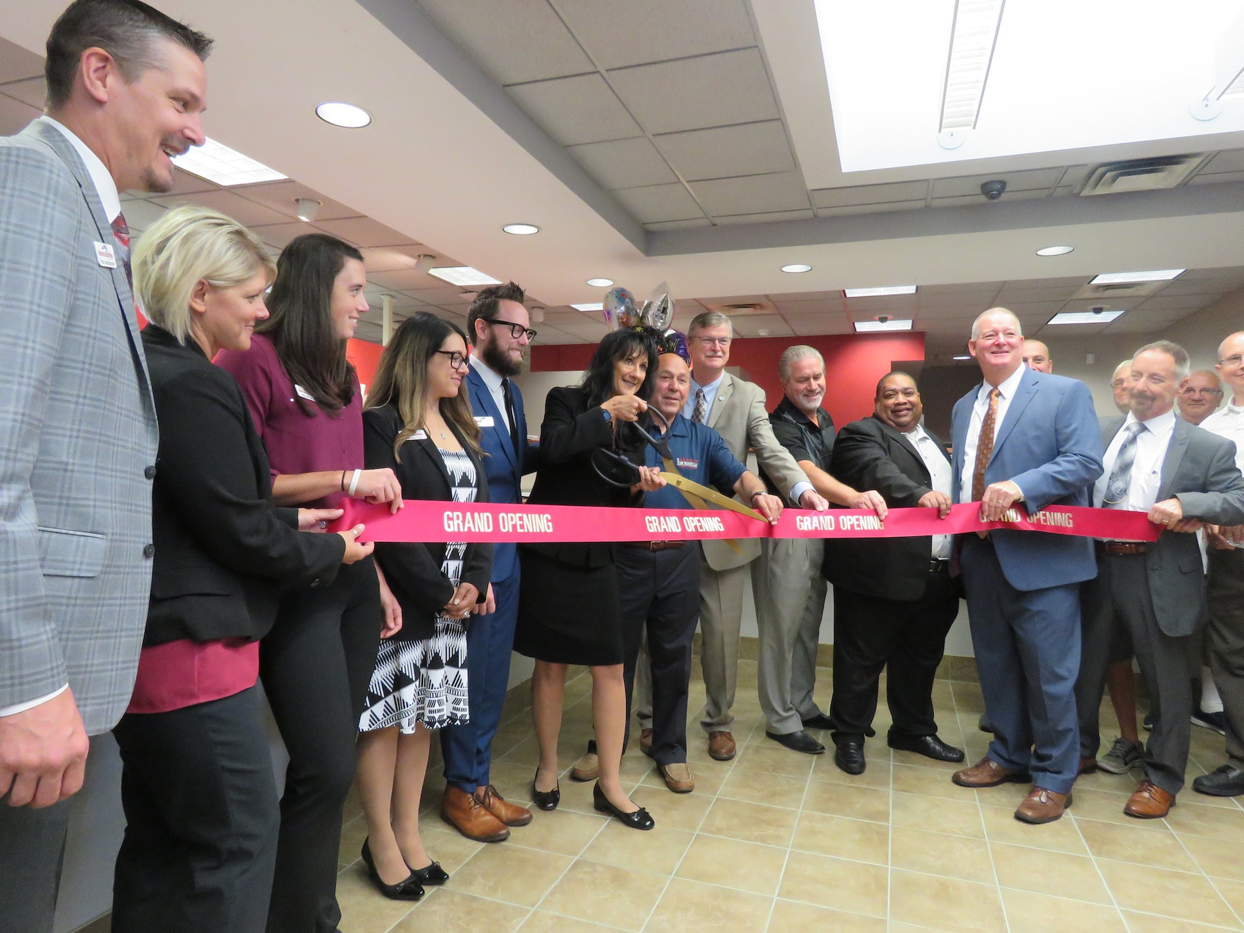 Local elected officials, BankOnBuffalo representatives and many more formally cut the ribbon to the new bank site in Wheatfield, 6947 Williams Road. (Photo by David Yarger)
